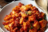 Comforting Sausage Ragu with Pillowy Ricotta Gnocchi
