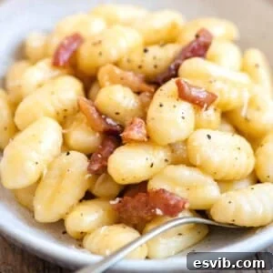 A close up of gnocchi carbonara