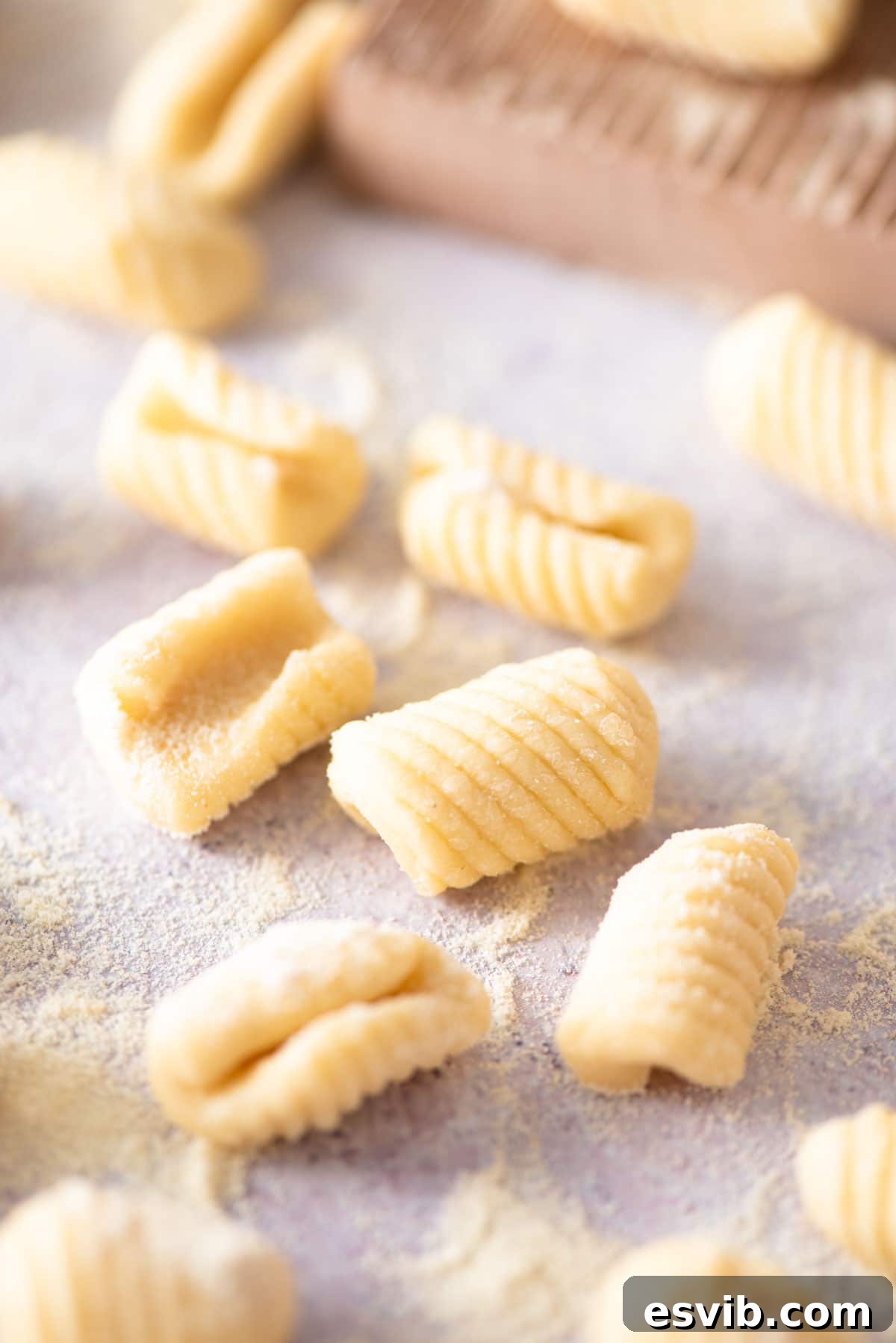 A close up of Gnocchetti Sardi pasta on a work surface