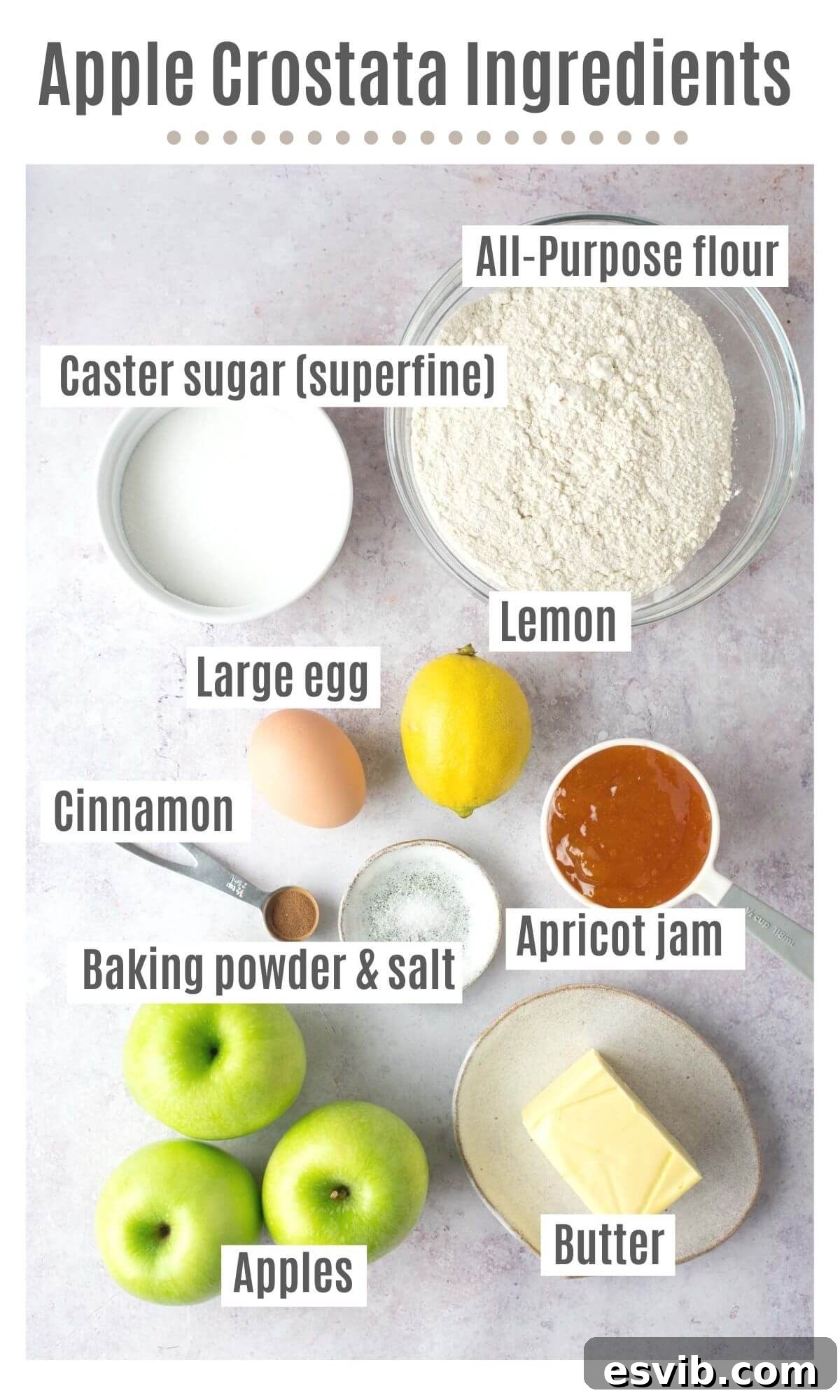 An overhead shot showcasing all the fresh ingredients required to make a homemade apple crostata