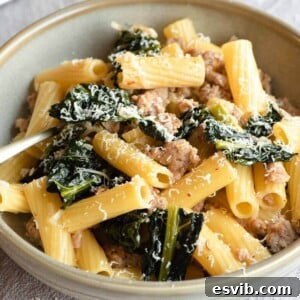 A close up of sausage and cavolo nero pasta in a bowl