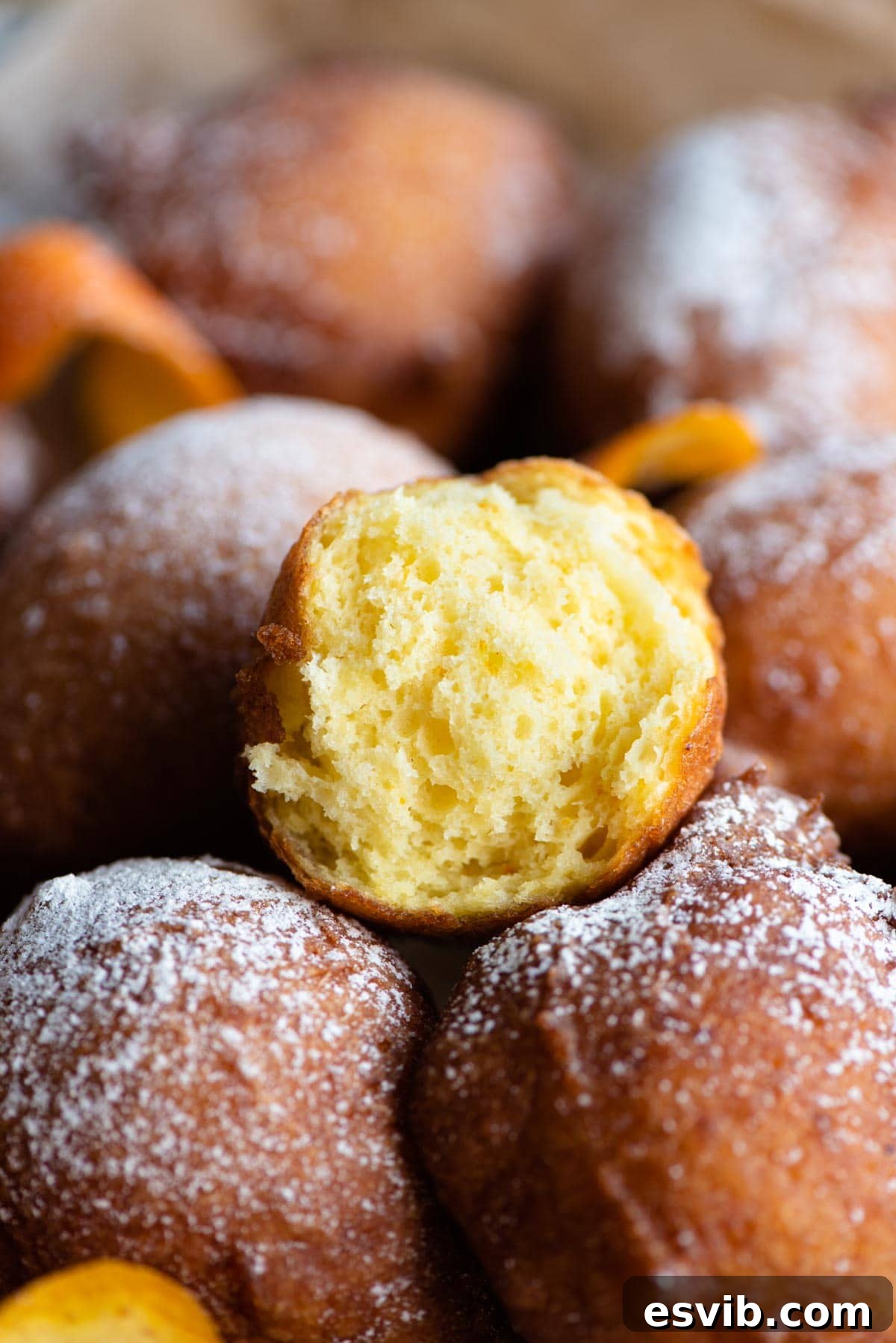 Sweet Italian Ricotta Puffs 6 A close up of a ricotta doughnut cut in half