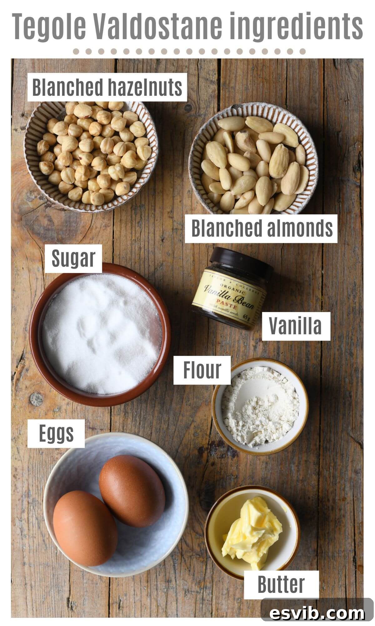Valdostan Hazelnut Almond Crisps 3 An overhead shot of all the ingredients for Tegole Valdostane, including blanched hazelnuts, almonds, sugar, butter, flour, egg whites, and vanilla extract.