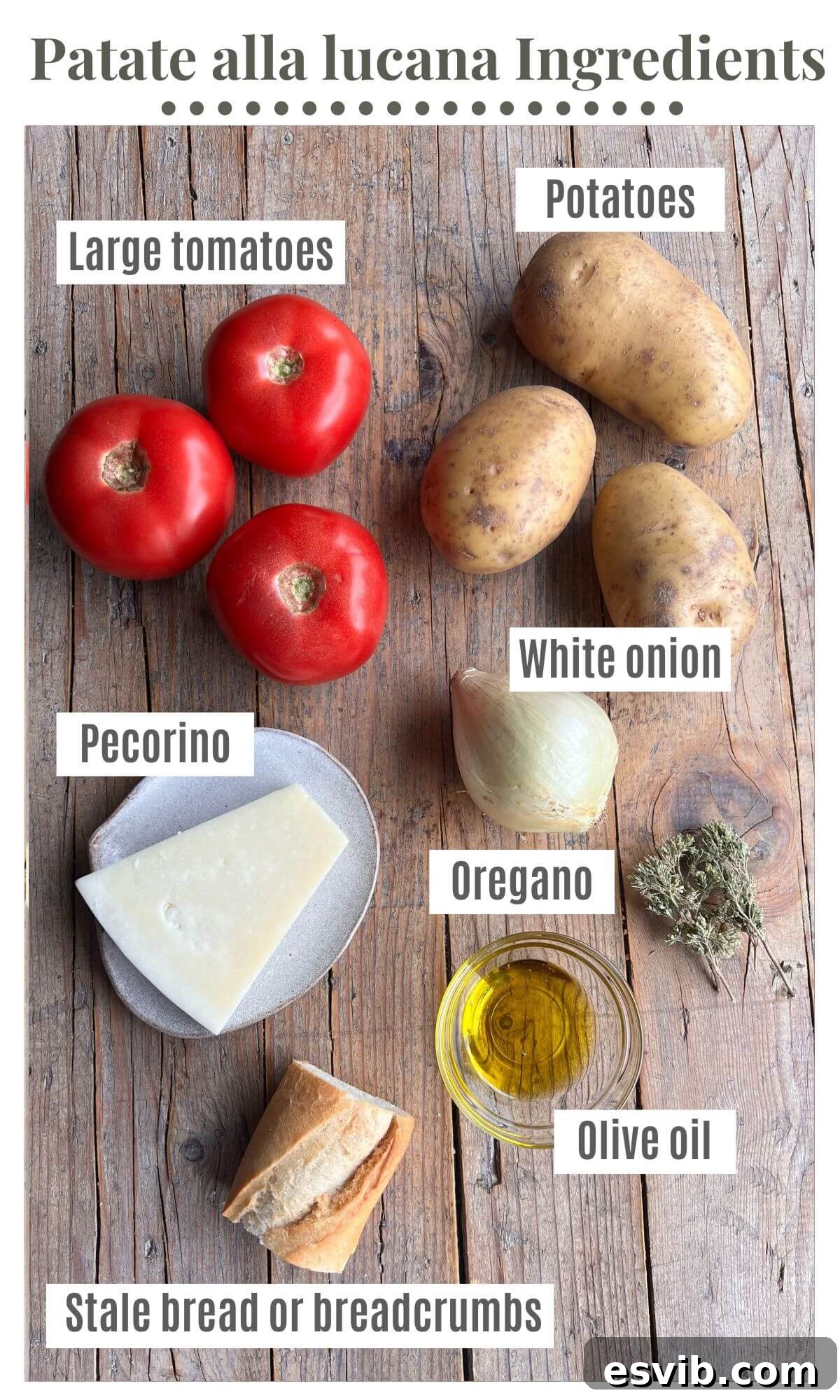 An overhead shot of all the ingredients needed to make Patate alla Lucana (Italian Potato Gratin), including potatoes, tomatoes, onions, oregano, Pecorino cheese, and olive oil.