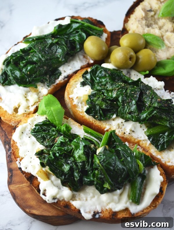 Crostini Three Ways Recipe - Simple and delicious Italian crostini for any party! Close-up of freshly prepared crostini with various toppings, showcasing the vibrant colors and textures, ready for an Italian aperitivo.