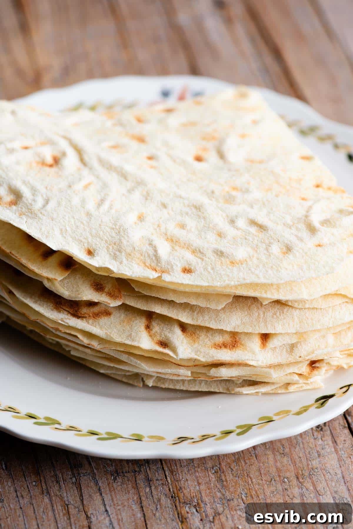 A close up of Pane Carasau piled high on a plate.