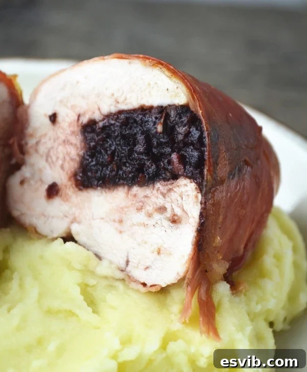 Delicious Black Pudding Stuffed Chicken with Cheesy Leeks, perfect for a cozy dinner Close-up of Black Pudding Stuffed Chicken with Cheesy Leeks, showcasing the rich textures, from www.insidetherustickitchen.com
