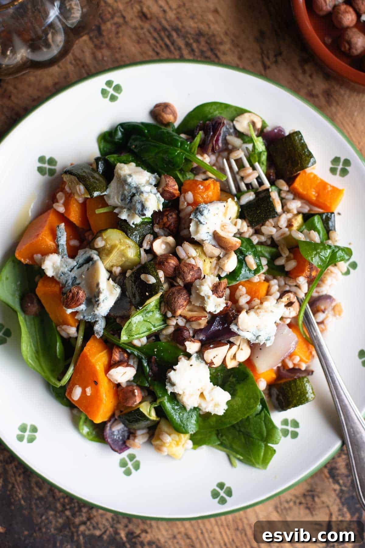 Cozy Butternut Farro with Gorgonzola 2 An overhead shot of a warm farro salad with butternut squash, spinach and gorgonzola, showcasing its rich autumn colors.