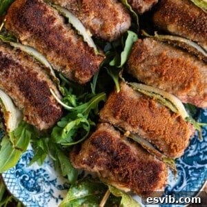 A close up cropped image of Sicilian involtini, showing their crispy texture and delicious appeal.