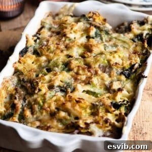Hearty Alpine Cabbage and Cheese Bake 7 A close-up cropped image of a cheese and cabbage casserole in a baking dish.