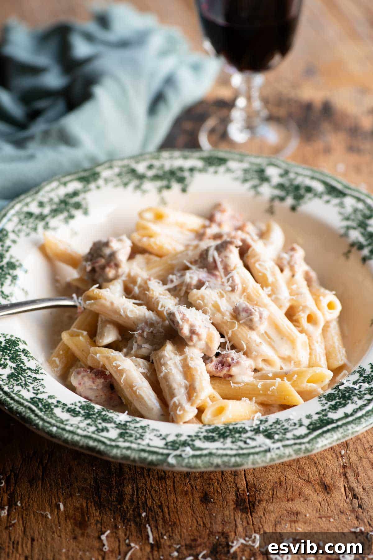A vibrant bowl of Pasta alla Norcina, adorned with fresh truffle shavings and Pecorino, ready to be enjoyed.