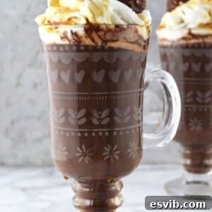 Let this Baileys Hot Chocolate with Maple Whipped Cream bring you comfort and joy this holiday season - Indulgent, delicious and simple!