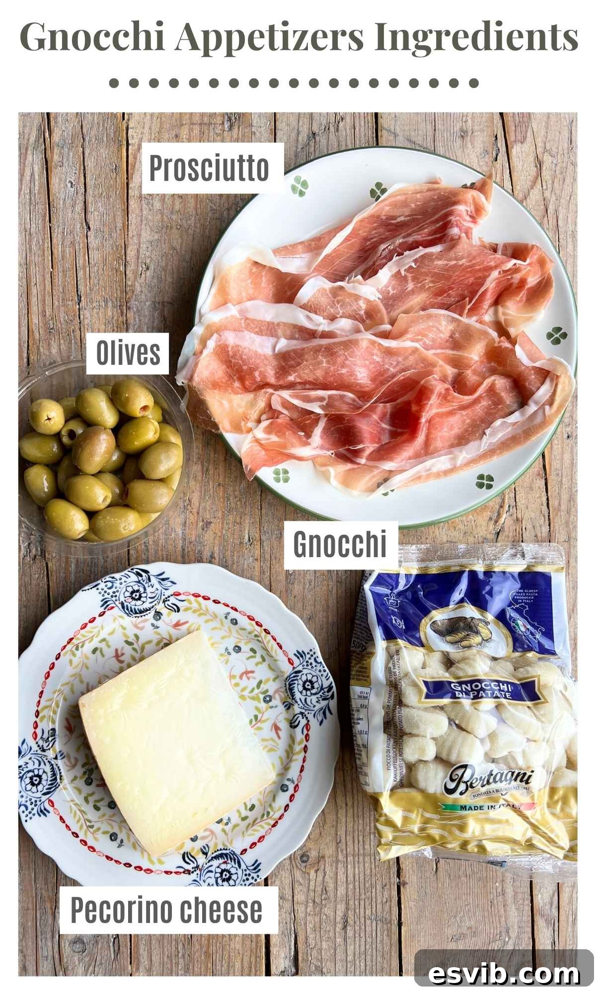 The ingredients to make fried gnocchi appetizers with prosciutto, pecorino and olives lying on a rustic wooden surface. The text labels read: Prosciutto, Pecorino cheese, Olives, Gnocchi. 