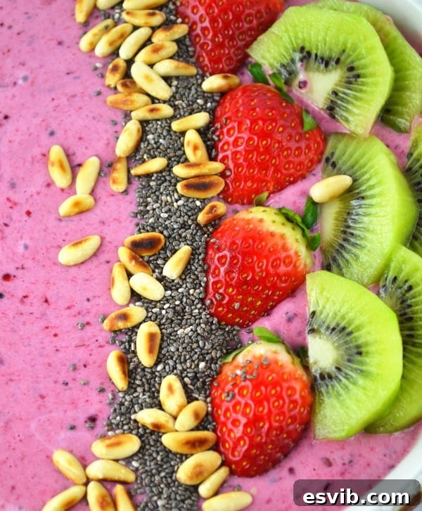 Delicious Berry Banana Smoothie Bowl 3 Close-up of a berry banana smoothie bowl showcasing its vibrant colors and diverse toppings.