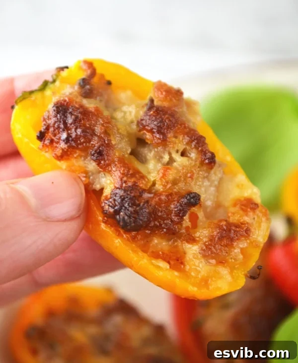 Sweet Pepper Poppers with Sausage and Stracchino 5 Hand stuffing sweet mini peppers with a savory blend of Italian sausage and stracchino cheese.