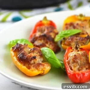 Sweet Pepper Poppers with Sausage and Stracchino 6 Sausage and Stracchino Stuffed Sweet Mini Peppers, a perfect Italian appetizer.