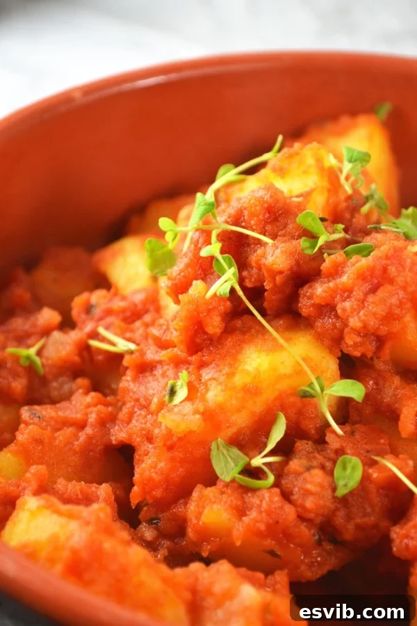 Patate Rifatte - an Italian potato side dish with fresh marjoram sprinkled on top