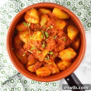 Patate Rifatte (redone potatoes) are a great potato side dish made from leftover boiled potatoes, fried with garlic and herbs and cooked in a delicious tomato sauce.