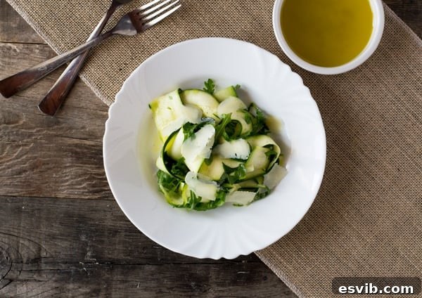 Shaved Zucchini Salad 5 Close-up of a whisked lemon and olive oil dressing in a small bowl, ready for the zucchini ribbon salad.