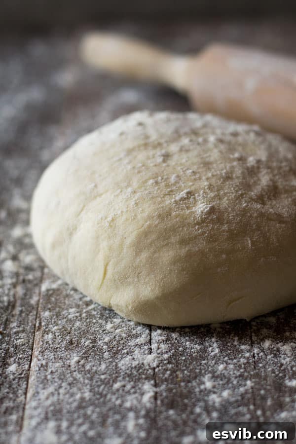 A close-up view of freshly made instant pizza dough without yeast, ready for rolling.