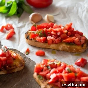 Bruschetta al pomodoro - classic Italian tomato bruschetta recipe made with ripe, juicy tomatoes, fresh basil and extra virgin olive oil. Served on char grilled, garlic toasts, an authentic taste of Italy.