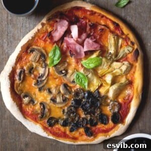 An overhead shot of a four seasons pizza
