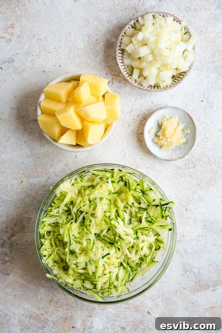 Ingredients prepped, cut and diced for making creamy zucchini soup