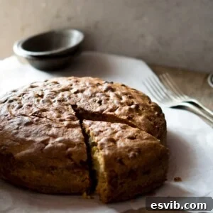 Slice of homemade Apple Olive Oil Cake with coffee