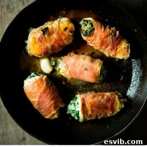 A perfectly plated Prosciutto Chicken Involtini with Spinach and Ricotta