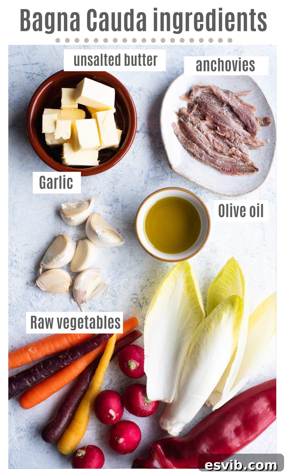 Bagna Cauda Warm Anchovy Garlic and Butter Dip 3 An overhead flat lay of all the essential ingredients laid out for making Bagna Cauda, including high-quality extra virgin olive oil, fresh garlic cloves, anchovy fillets in oil, and a block of unsalted butter, on a wooden surface.