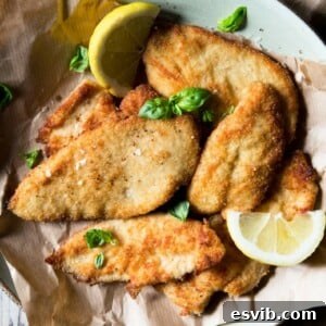 Breaded chicken cutlets with lemon butter