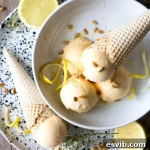 A cropped image of scoops of lemon ice cream in a bowl