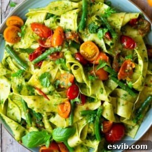 Pappardelle pasta with green beans, tomatoes and pesto