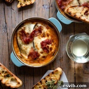 Eggplant Lasagna with Prosciutto and Mozzarella, in a square serving dish.