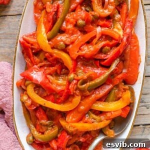 Peppers in tomato sauce on a serving plate