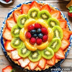 A square image of an Italian fruit tart, Crostata di Frutta.