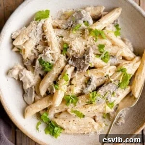 A close up of pasta alla boscaiola in a bowl