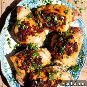 A finished plate of Nduja baked chicken, looking crispy and delicious.