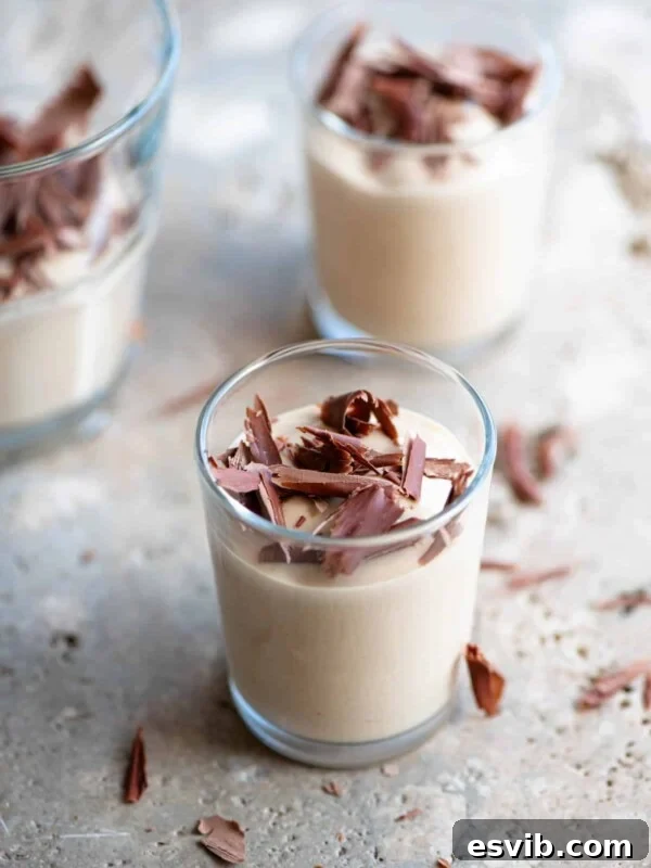 Ricotta al Caffè in small glasses topped with dark chocolate.